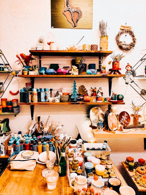 Colorful art studio filled with painting supplies and crafts.