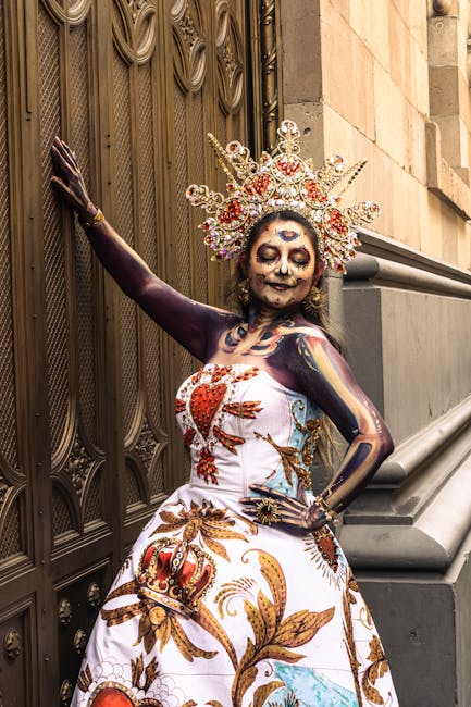 Creative portrait of a woman in Dia de los Muertos costume with intricate details against an ornate backdrop.